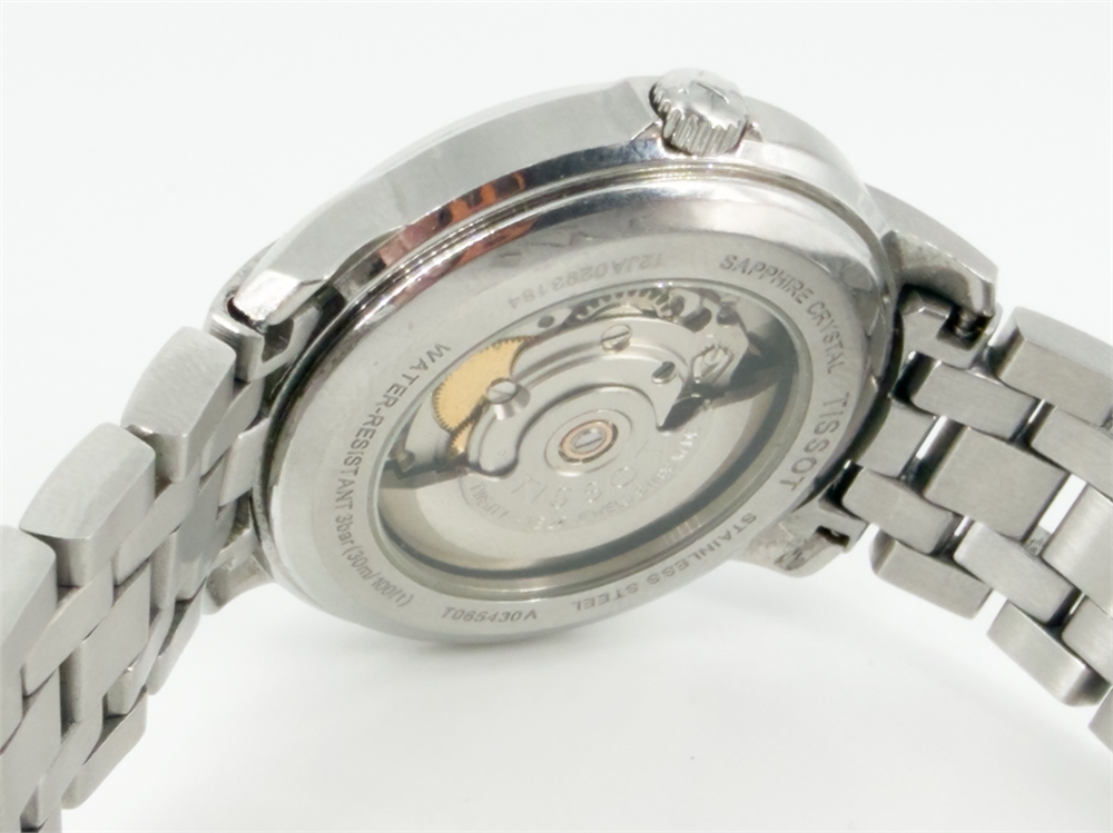 Швейцарские механические часы Tissot Automatics III T065.430.11.051.00 (Б/У)
